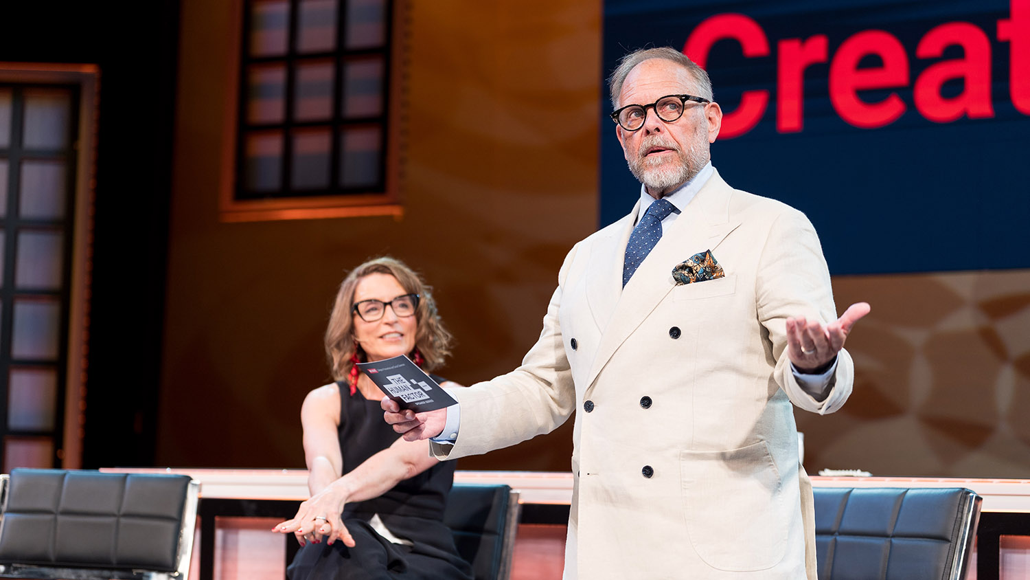 Alton Brown speaks to the crowd during The Human Factor