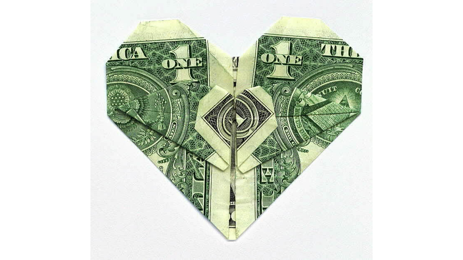 origami heart made from a dollar bill