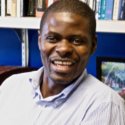 Headshot of Moses Khisa