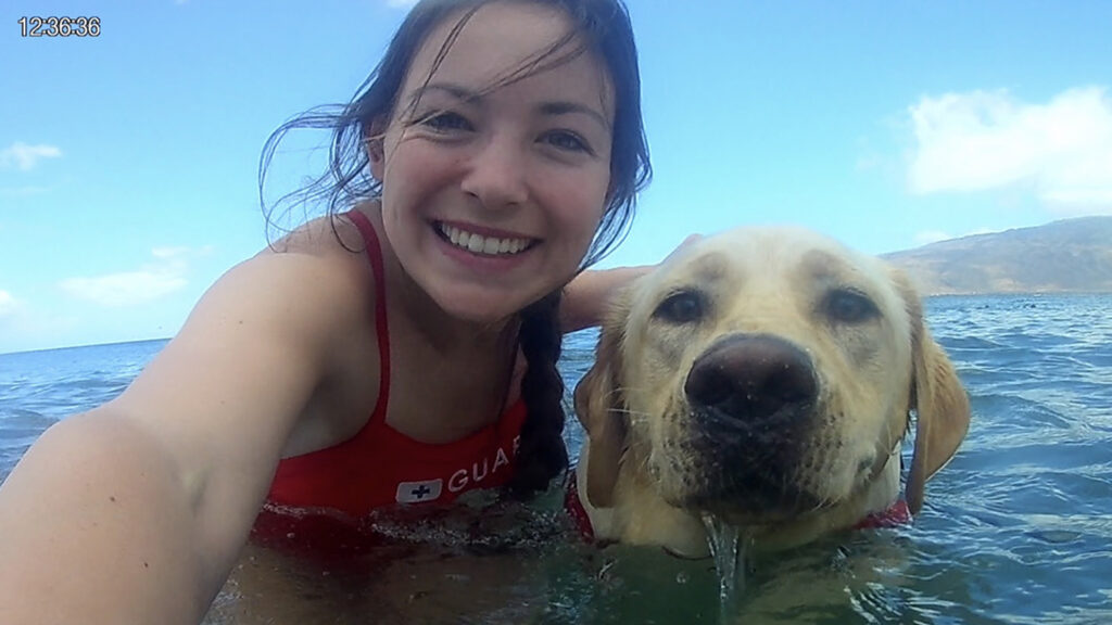 Sydney and dog in water