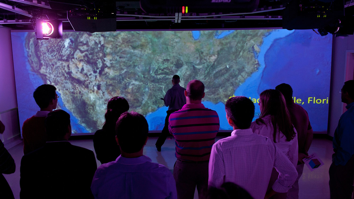 Students work in a visualization lab