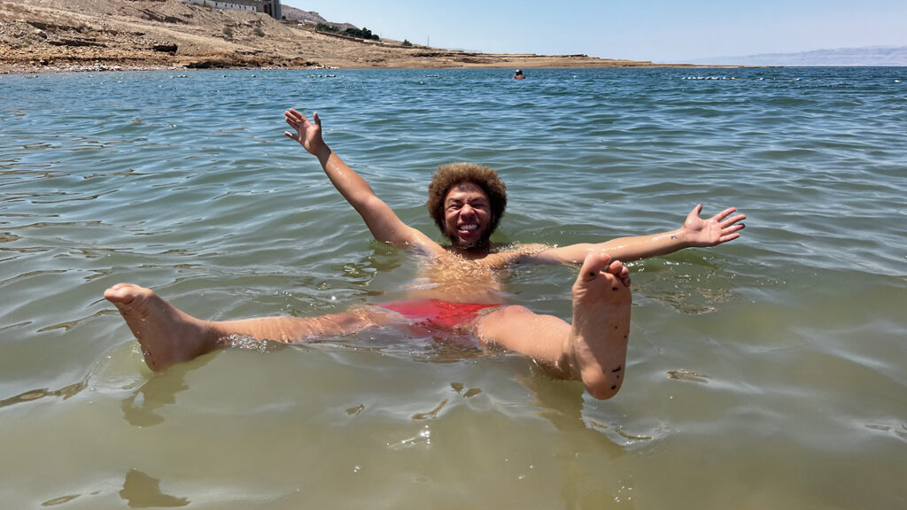 Anthony Ramsey floats in a sea.