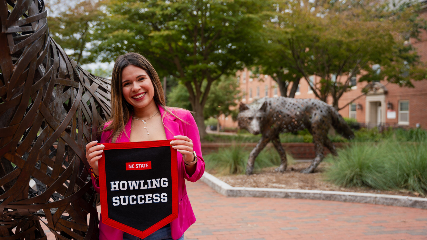 Miroslava Colan proudly displays her Howling Success banner.