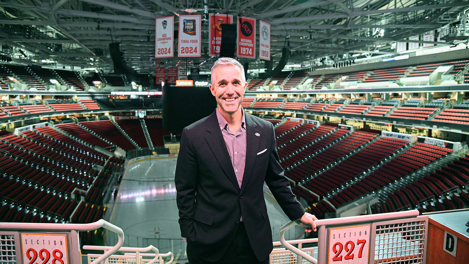 Doug Warf stands in the Lenovo Center arena.