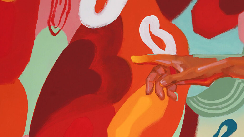 A close-up photo shows a finger pointing in the mural.