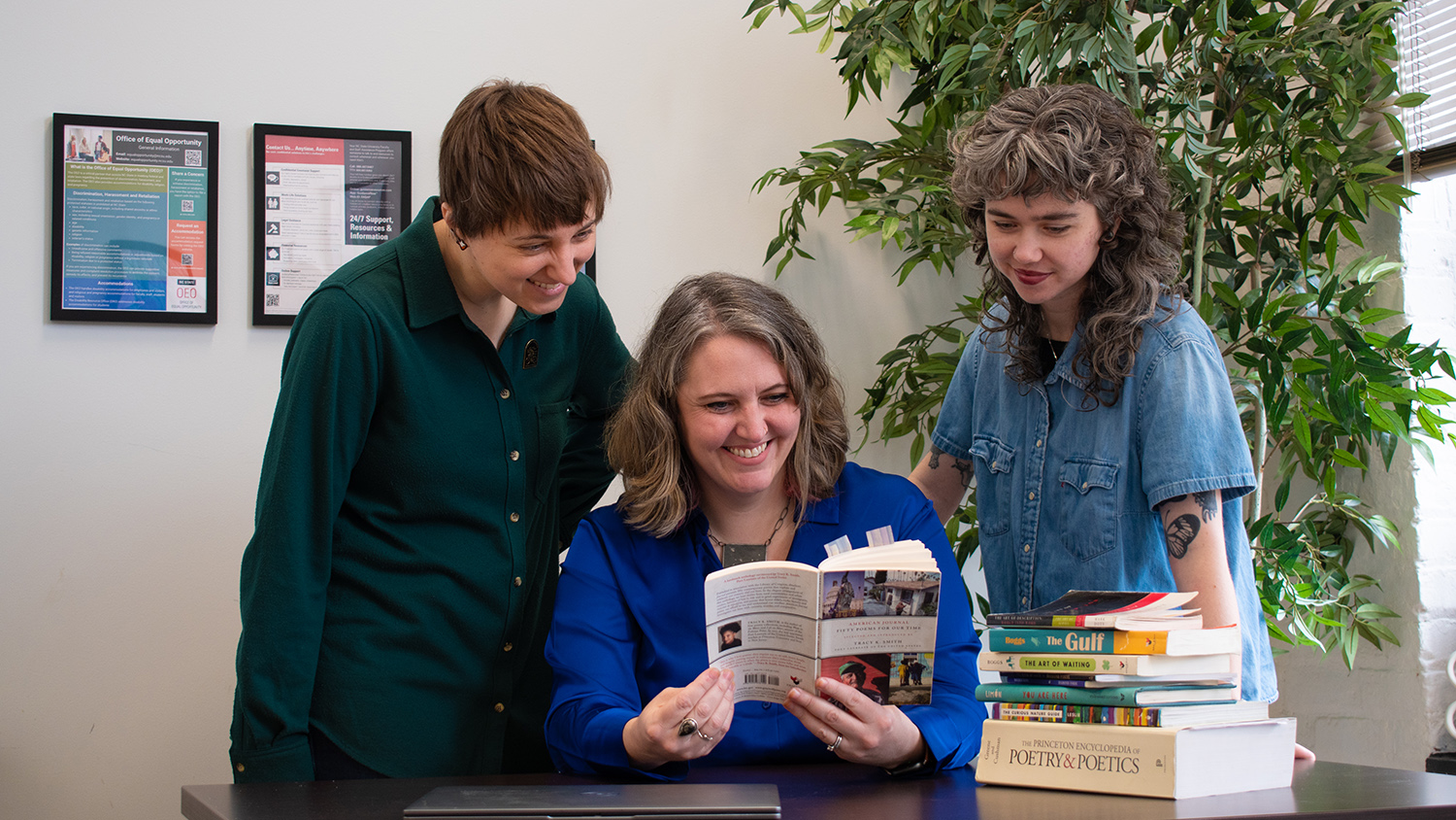 Creative Writing professor with two MFA students.