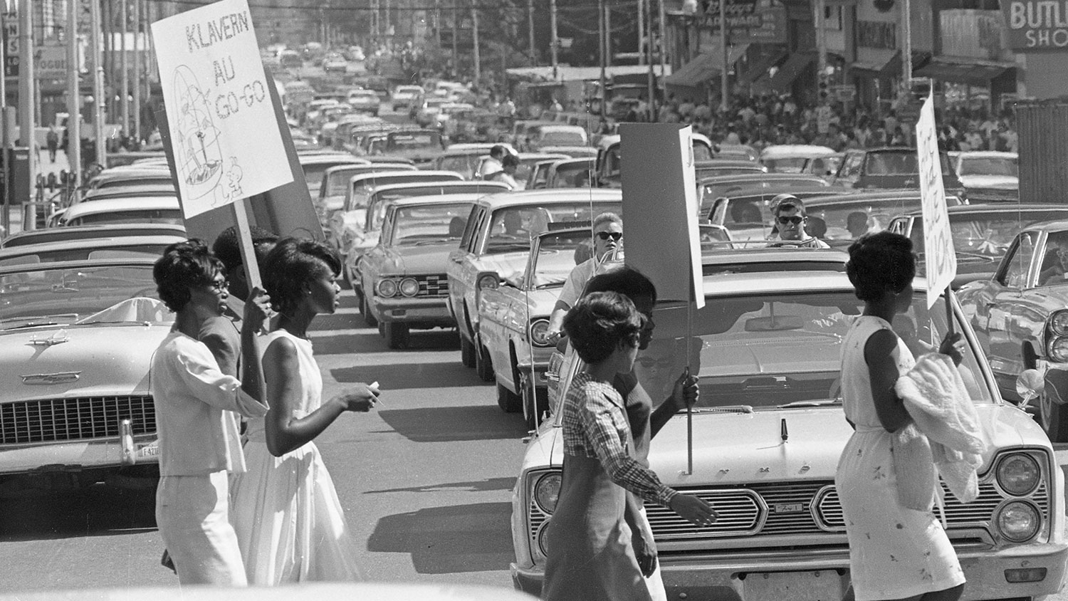 Protesters march during a Ku Klux Klan rally in downtown Raleigh.