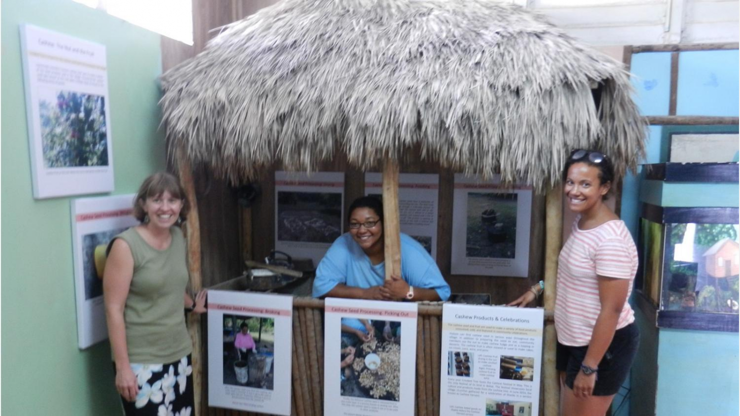 students standing in front of exhibit